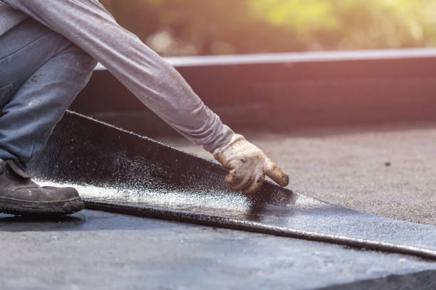Professional Waterproofing technician working in Midland, IN